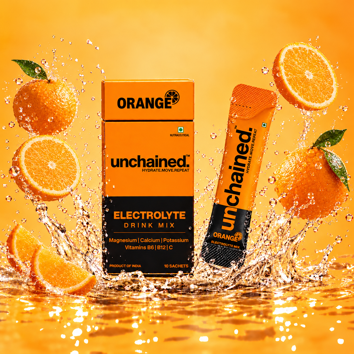 Unchained Orange Electrolyte Drink Mix box and stick surrounded by fresh orange slices and golden water splash