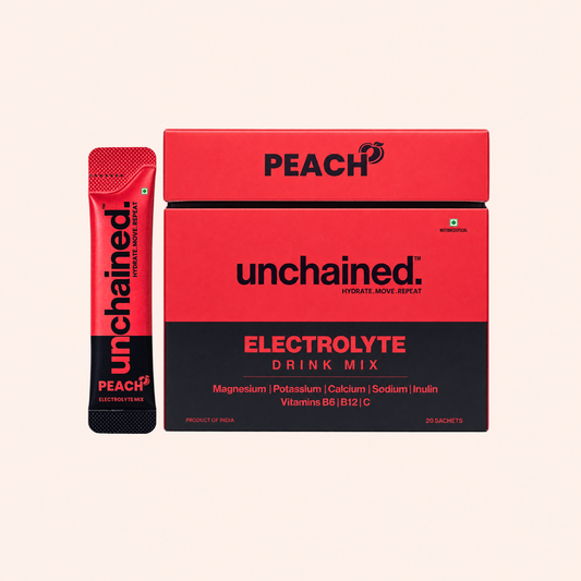 Unchained Peach Electrolyte Drink Mix 20-stick family pack box with a single electrolyte stick