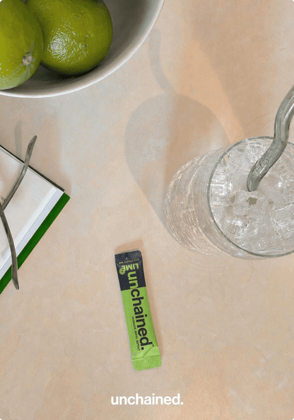 Portable Unchained Lime hydration sachet for travel and workouts